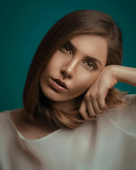 a beautiful young woman posing with her hand on her head, a character portrait, inspired by Elsa Bleda, trending on pexels, short brown hair and large eyes, androgynous, iridescent skin, trending on 5 0 0 px