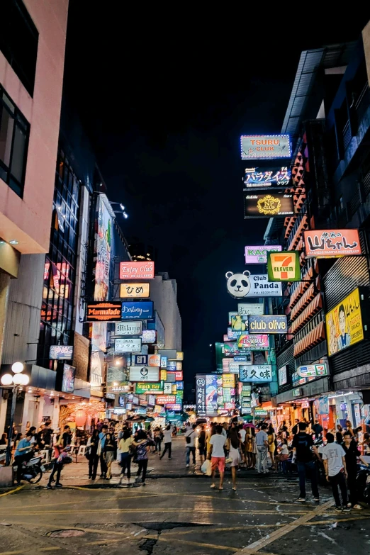 a crowded city street filled with lots of people, a picture, by Emanuel Witz, trending on unsplash, ukiyo-e, neon electronic signs, square, taken in the late 2010s, summer night