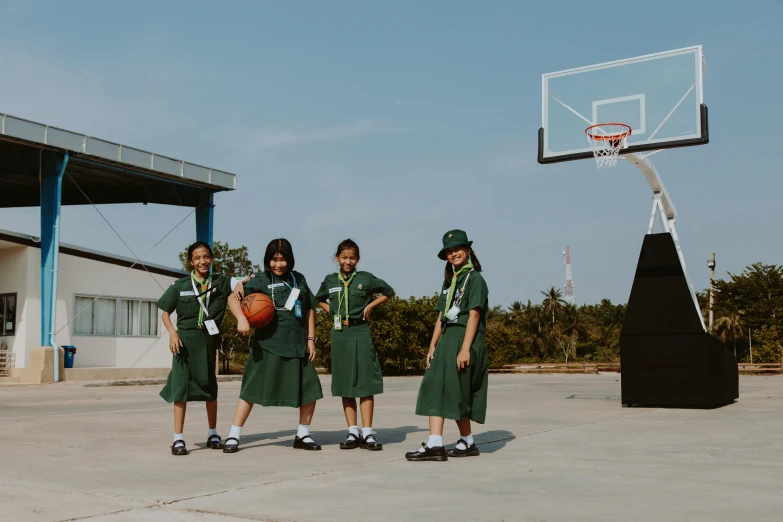 a group of girls standing next to each other on a basketball court, featured on dribble, indonesia, fzd school of design, teaser, posed