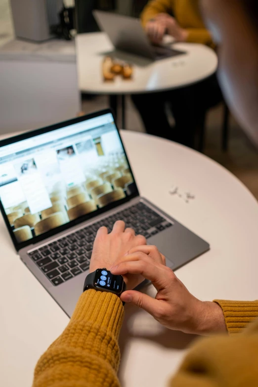 a person sitting at a table with a laptop, a computer rendering, by Matthias Stom, trending on unsplash, holding gold watch, student, ui and ux, instagram picture