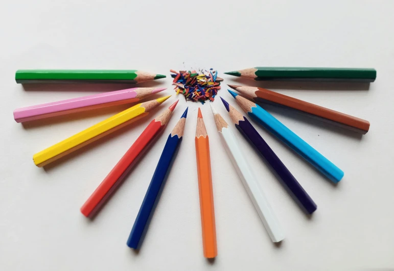 a group of colored pencils arranged in a circle, a pointillism painting, pexels contest winner, 'white background'!!!, an artistic pose, miscellaneous objects, colourised