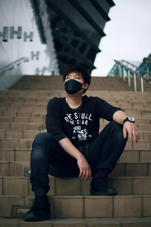 a man sitting on some steps wearing a mask, inspired by Gang Hui-an, pexels contest winner, wearing a dark shirt and jeans, discord profile picture, kojima, peter chan