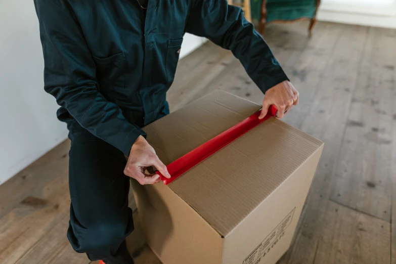 a man holding a box with a red handle, obi strip, thick linings, thumbnail, 8