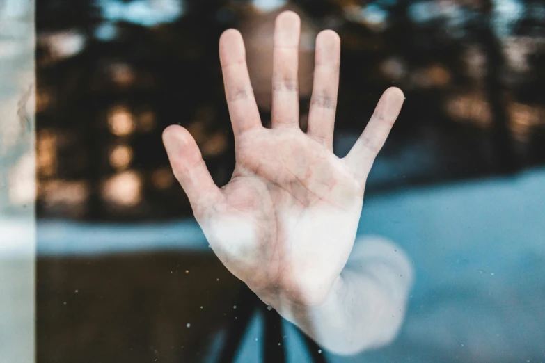 a person holding their hand out of a window, trending on pexels, hurufiyya, drowning, palm body, 15081959 21121991 01012000 4k, gentle expression