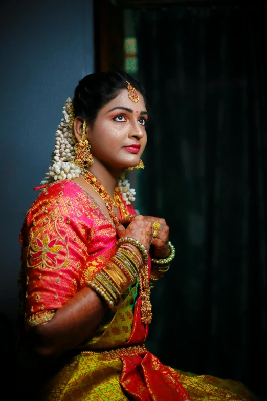a woman in a red and gold dress, by Max Dauthendey, pexels contest winner, kerala motifs, bride, square, portrait soft low light