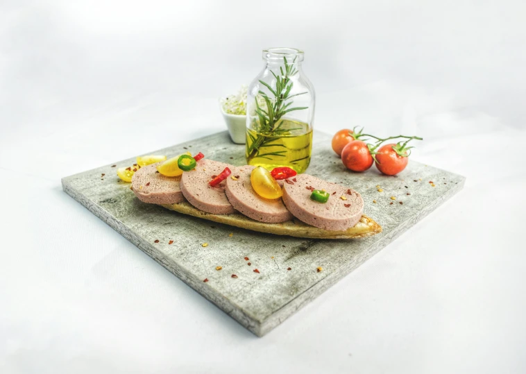 a piece of meat sitting on top of a cutting board, a picture, in style of norman foster, humus, detailed product image, concrete