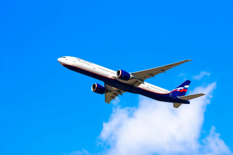 a large jetliner flying through a blue sky, pexels contest winner, renaissance, strong blue and orange colors, post processed, 1 2 9 7, blue and red