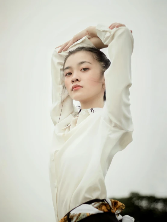 a woman in a white shirt and black pants, by Tan Ting-pho, unsplash, renaissance, dilraba dilmurat, wear's beige shirt, profile pic, portrait image