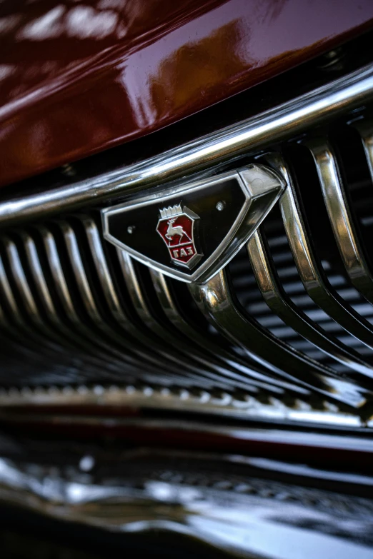 a close up of a car's grille with a crown on it, alfa romeo project car, icon, splash image, restomod
