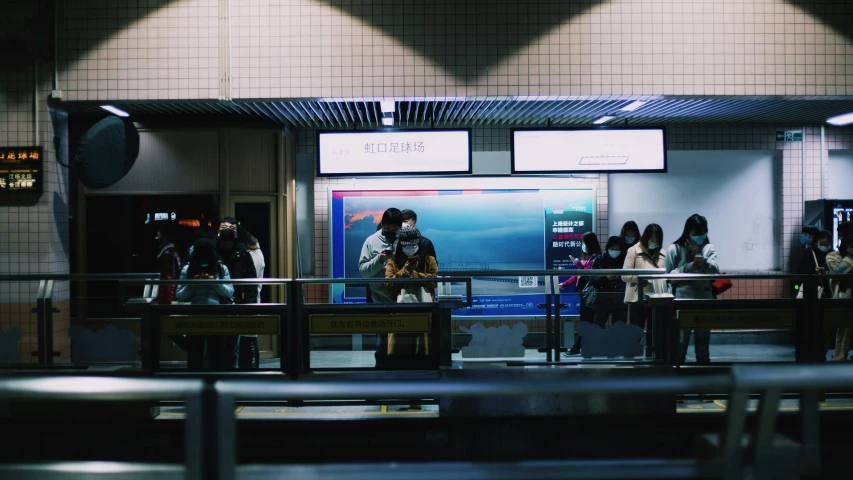 a group of people waiting at a train station, unsplash, taiwan, monitor, thumbnail, black. airports