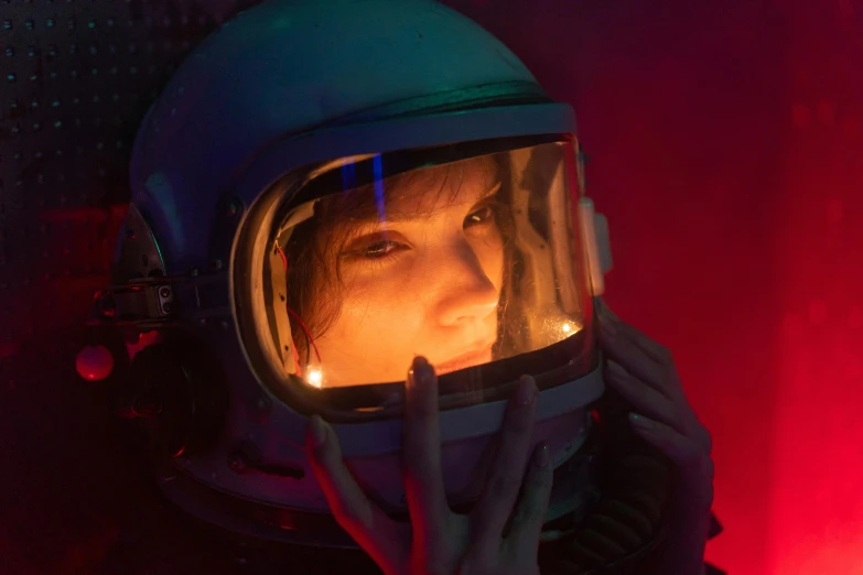 a woman in a space suit talking on a cell phone, an album cover, inspired by Elsa Bleda, pexels contest winner, fantastic realism, still from stranger things, helmet view, portrait of alexandra daddario, cgsociety 4k”