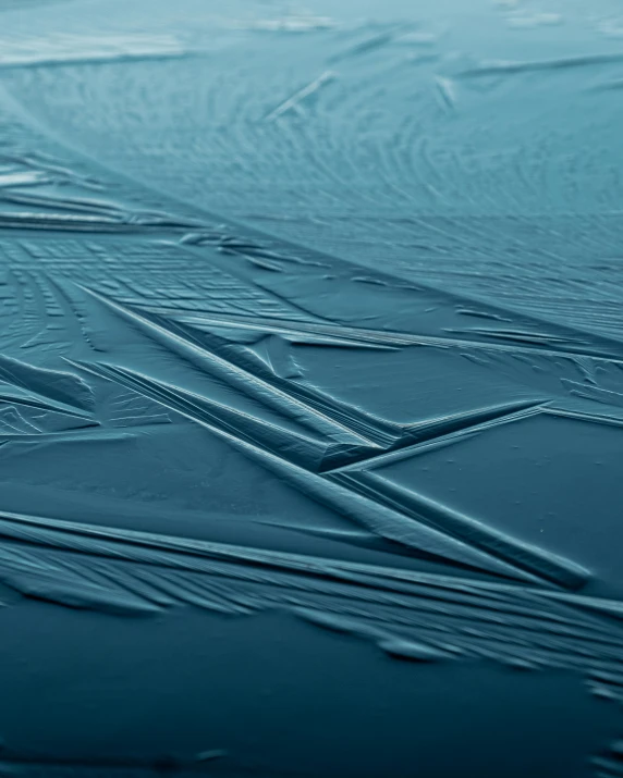 a close up of ice on the surface of a body of water, 3d printed line texture, torn sails, vinyl material, quixel megascan