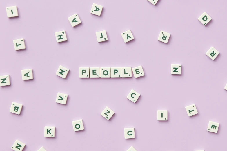 scrabbles spelling people on a pink background, by Arabella Rankin, trending on pexels, antipodeans, smooth purple skin, on a gray background, busy with people, blank background
