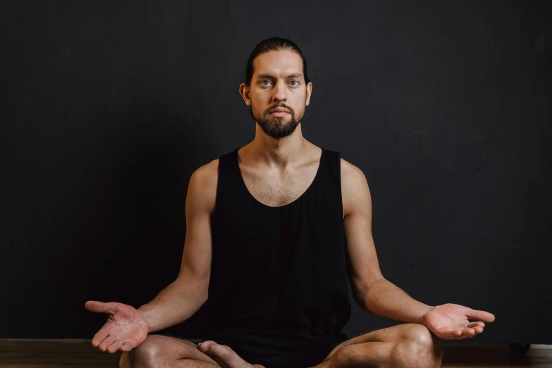 a man sitting in the middle of a yoga pose, a portrait, unsplash, renaissance, portrait image, no - text no - logo, avatar image, concept photo