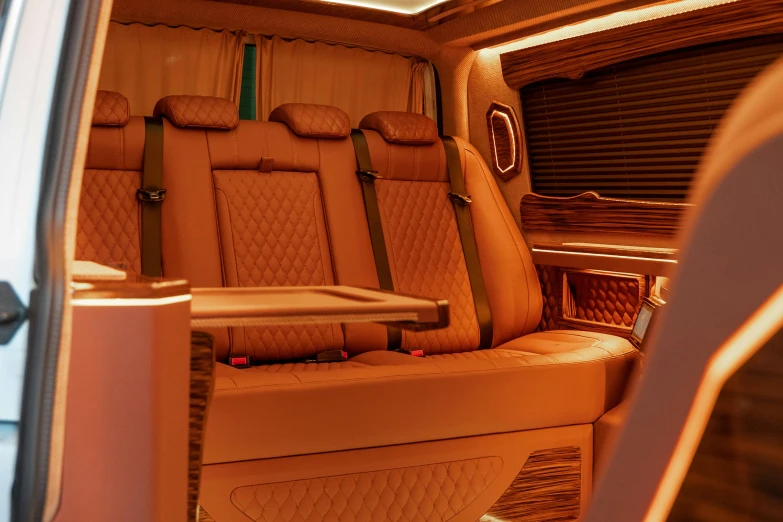 a close up of a seat in a vehicle, a digital rendering, by derek zabrocki, renaissance, warm orange lighting, van, royal interior, high-quality render