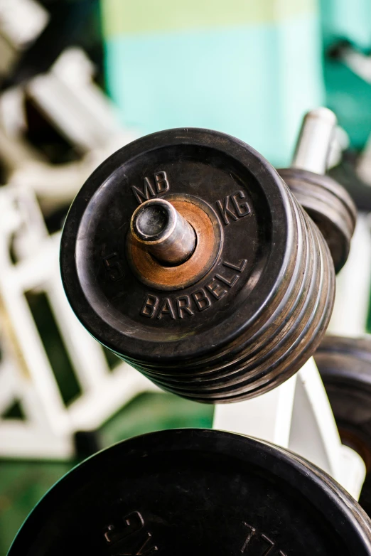 a couple of dumbs sitting next to each other, by David Simpson, unsplash, bauhaus, lifting weights, detail shots, 15081959 21121991 01012000 4k, deep shafts