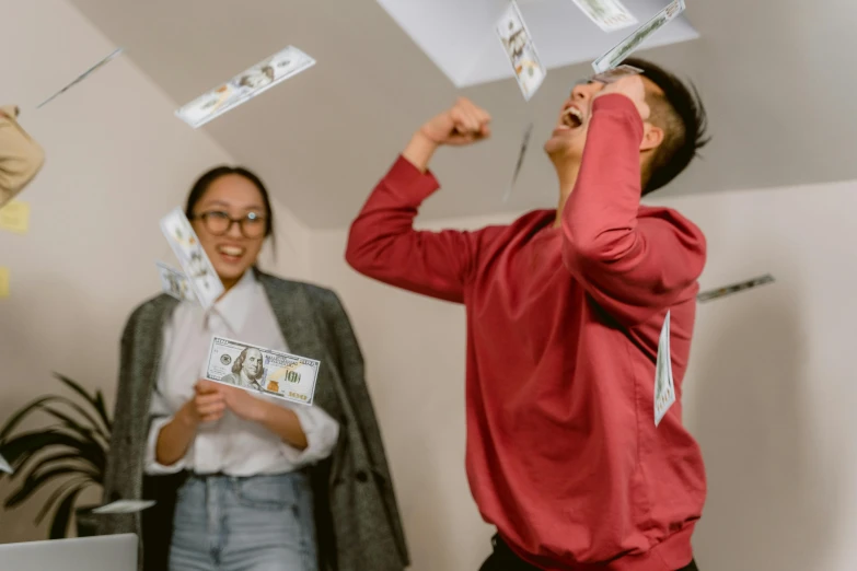 a group of people throwing money in the air, pexels contest winner, medium shot of two characters, casual game, [ [ hyperrealistic ] ], 2 people