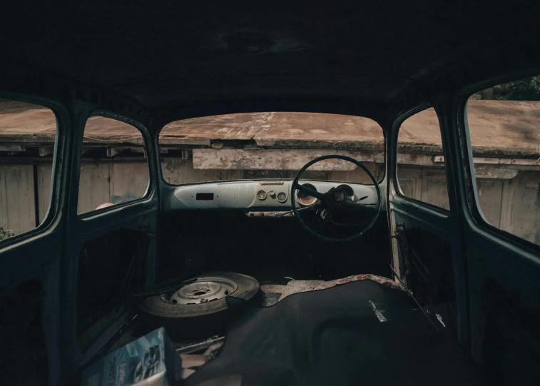the interior of an old, run down car, an album cover, pexels contest winner, renaissance, 15081959 21121991 01012000 4k, petrol aesthetic, dressed in a worn, interior of a small