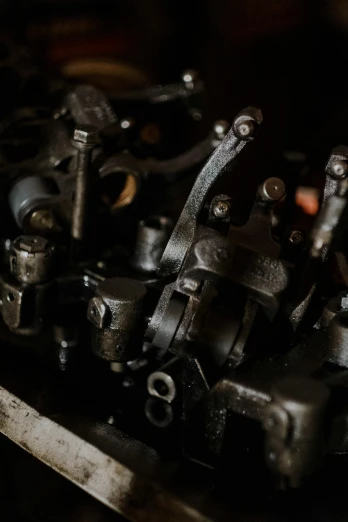 a close up of a machine on a table, an engraving, trending on unsplash, assemblage, broken shackles, valves, high quality photo, made of rubber