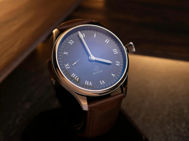 a close up of a wrist watch on a table, a portrait, inspired by Johannes Mytens, pexels contest winner, purism, midnight blue, 3 d render even lit, brown, roman numerals
