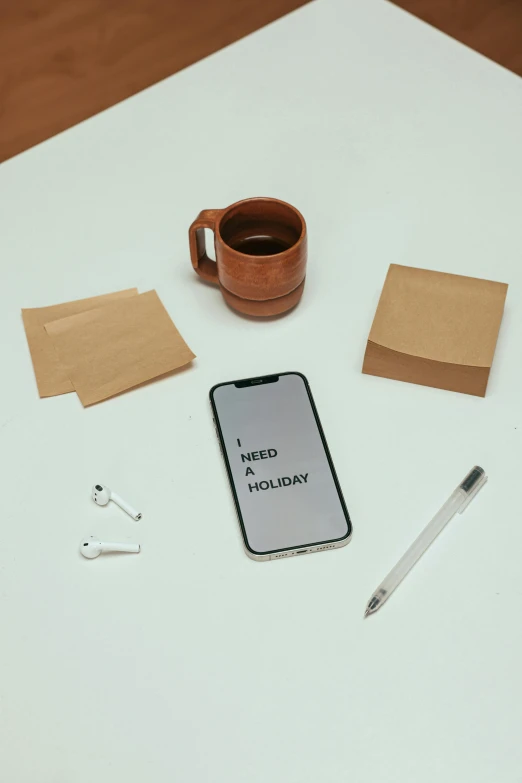a cell phone sitting on top of a table next to a cup of coffee, a still life, trending on pexels, hyperrealism, brown paper, avatar image, hidden message, knolling