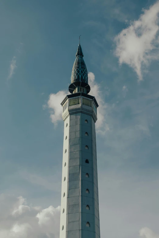 a tall tower with a clock on top of it, hurufiyya, 4 k cinematic still, paisley, scandinavian, islamic