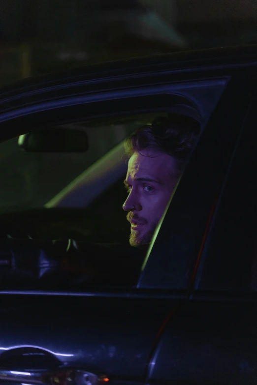 a man sitting in the passenger seat of a car, a picture, happening, promo still, nights, square, carson ellis