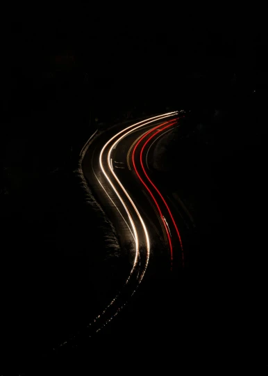 a long exposure photograph of a highway at night, unsplash contest winner, minimalism, tail lights, on a black background, ilustration, high resolution image