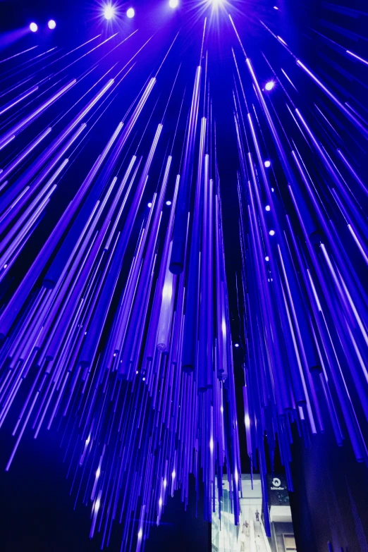 a bunch of lights that are in the air, light and space, thin straight purple lines, hypersphere, dramatic blue lighting, instagram post