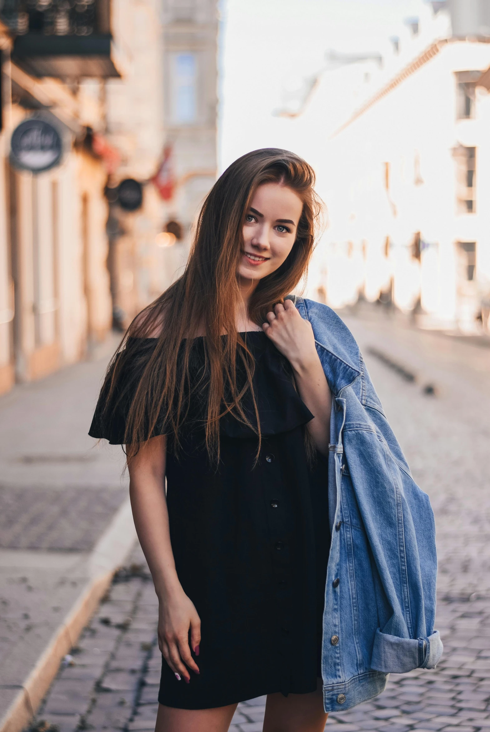 a woman in a black dress and a denim jacket, pexels contest winner, pokimane, 15081959 21121991 01012000 4k, snapshot, portrait of sanna marin