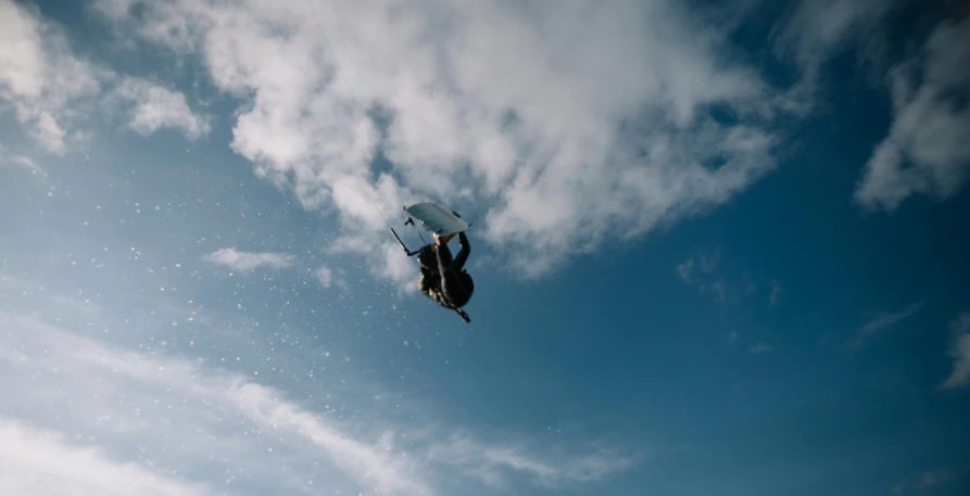 a man flying through the air while riding skis, a picture, unsplash contest winner, figuration libre, summer sky, surfing, profile image, 2 0 2 2