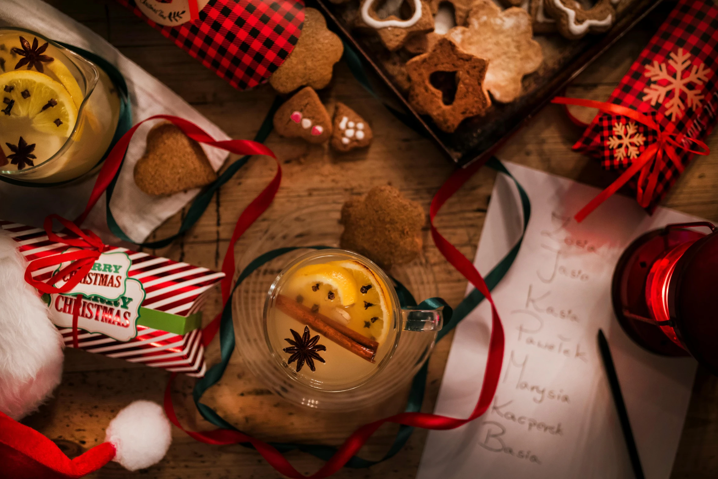 a table topped with christmas cookies and muffins, by Julia Pishtar, drinks, handwritten, ginger, teaser