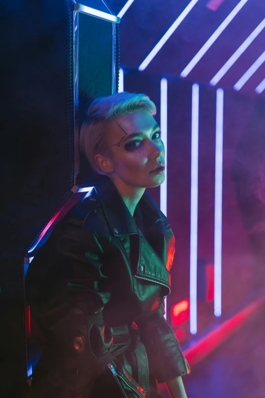 a man standing in front of a neon light, cyberpunk art, inspired by Elsa Bleda, trending on pexels, bauhaus, girl with short white hair, she wears leather jacket, charli xcx, female model