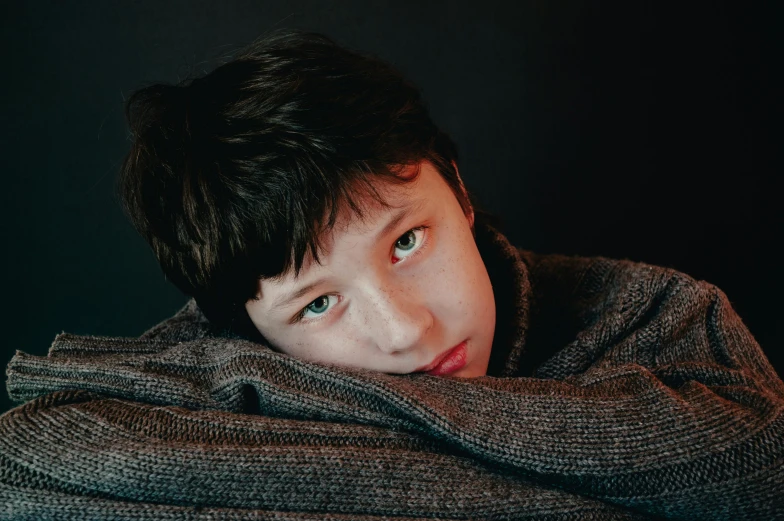 a close up of a person wearing a sweater, by Adam Marczyński, pexels contest winner, hyperrealism, portrait of 14 years old boy, wearing a dark sweater, pouty, instagram post