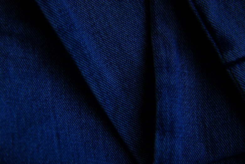 a close up of a suit jacket and tie, by Thomas Häfner, renaissance, blue-fabric, fabrics textiles, ultramarine blue, denim