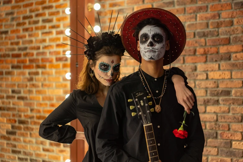 a man and a woman in day of the dead costumes, pexels contest winner, wearing black dress and hat, promotional image, band, photoshoot