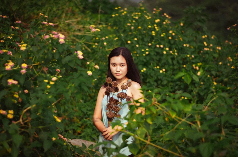 a woman holding a teddy bear in a field of flowers, an album cover, inspired by Tang Yifen, art photography, portrait image, medium format, avatar image, rose-brambles