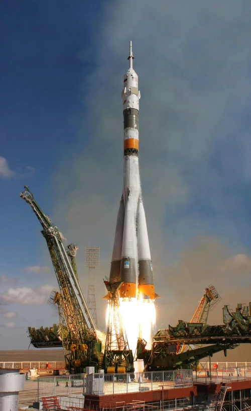 a saturn rocket lifts off from the launch pad, inspired by Aleksandr Gerasimov, satellite view, vostok-1, large head, july 2 0 1 1