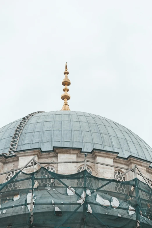 a large dome with a clock on top of it, by Matija Jama, trending on unsplash, arabesque, mosque, 2 5 6 x 2 5 6, tiled roofs, unfinished