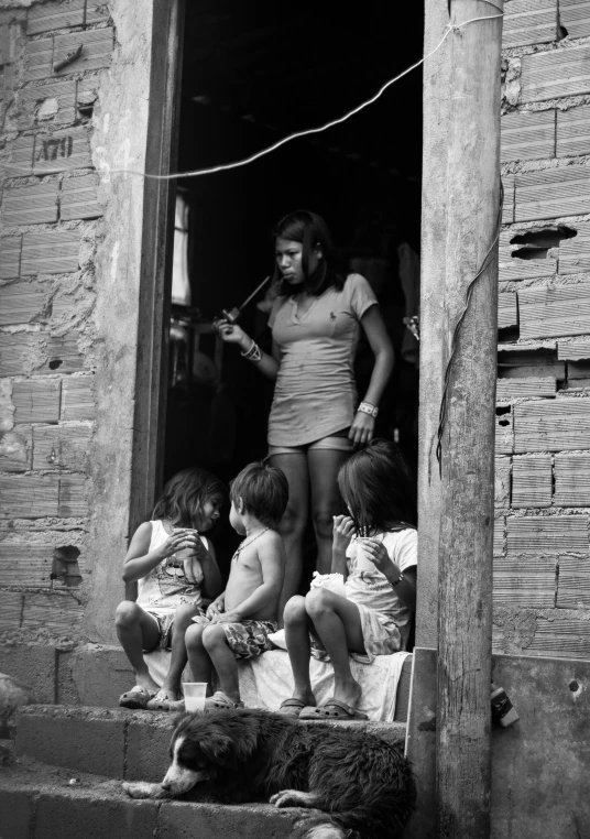 a black and white photo of a woman and children, conceptual art, location ( favela ), promo image, woman smoking cigarette, at home