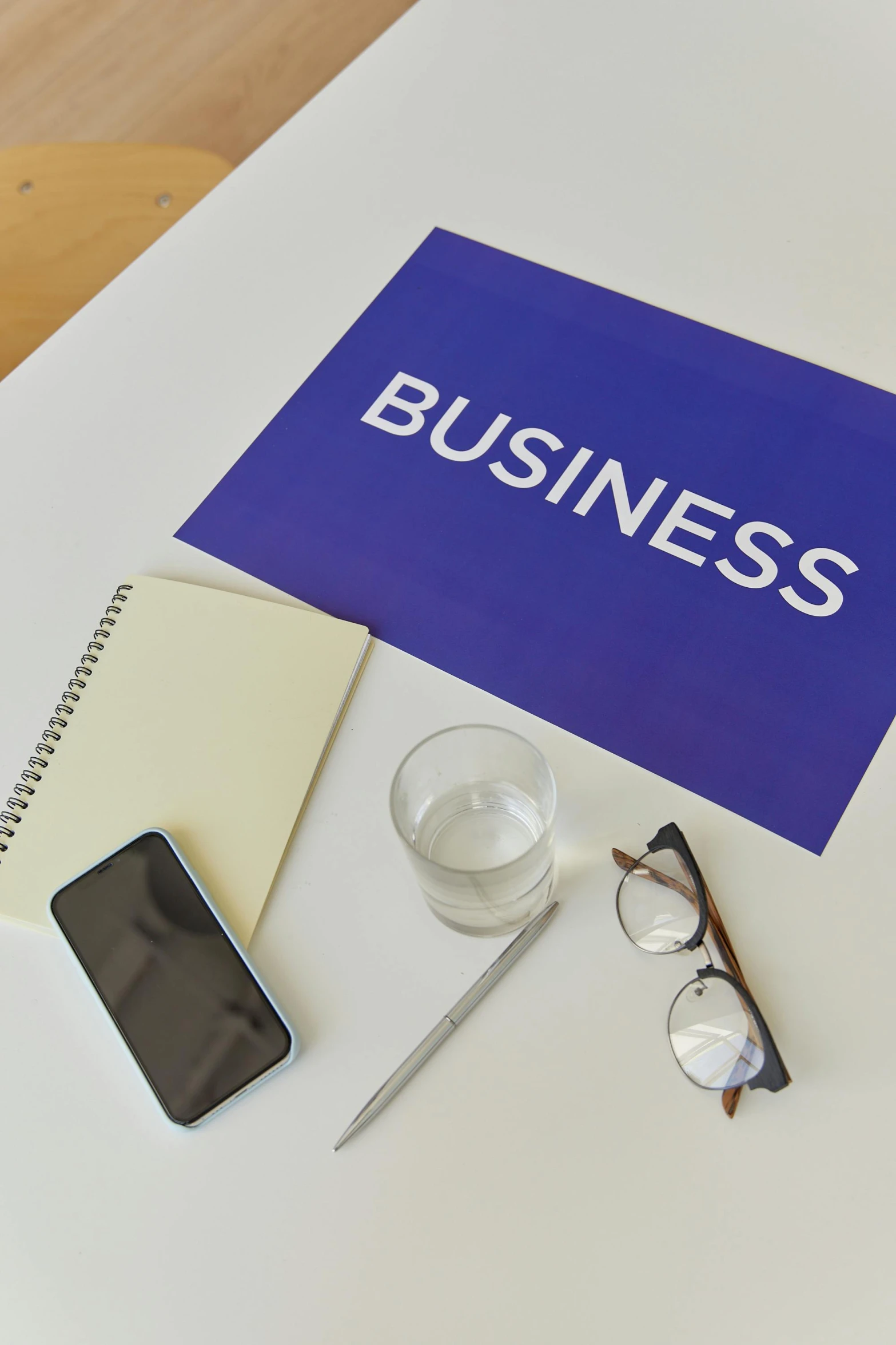 a laptop computer sitting on top of a white desk, a picture, private press, business logo, thumbnail, digital image, business