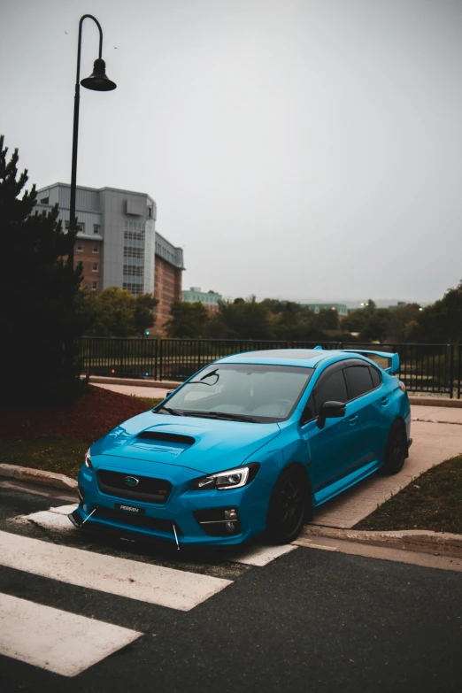 a blue car parked on the side of the road, inspired by An Gyeon, pexels contest winner, wrx golf, square, samurai vinyl wrap, 🚿🗝📝