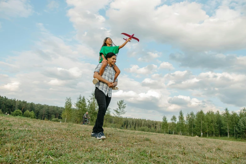 a man and a child flying a kite in a field, pexels contest winner, hurufiyya, excited russians, people on a picnic, jets, thumbnail