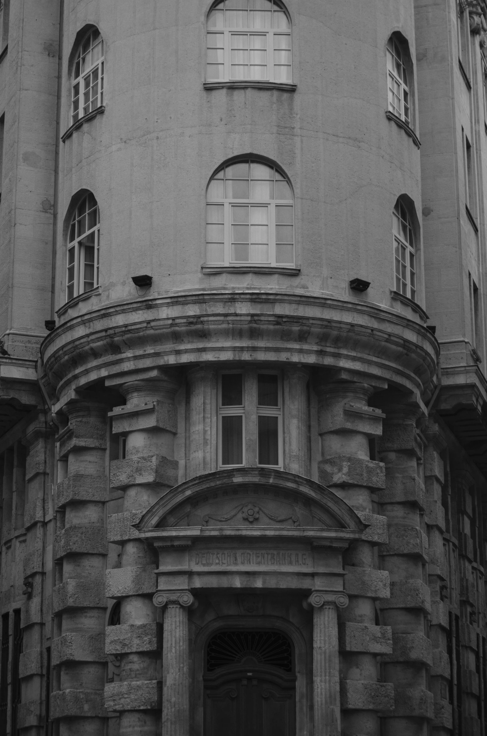 a black and white photo of a building, inspired by Josef Navrátil, 8k 50mm iso 10, budapest, analogue photo low quality, old library