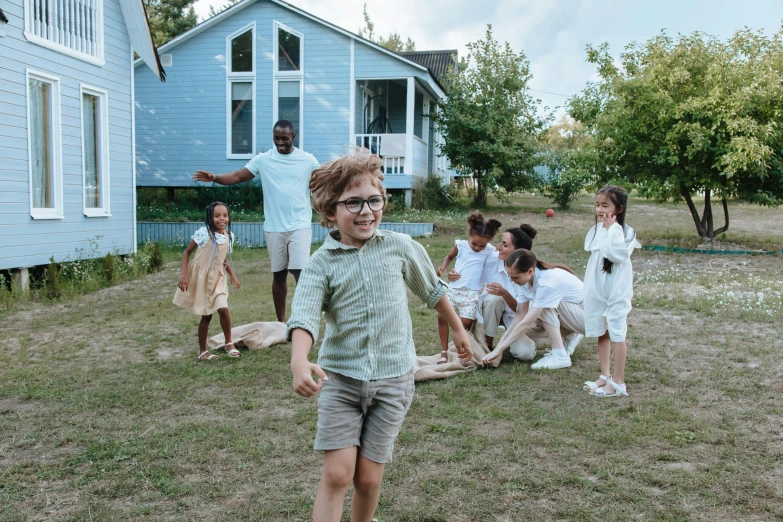 a group of children playing a game of frisbee, an album cover, by Carey Morris, pexels contest winner, wearing a linen shirt, cottage core, wearing medium - sized glasses, riyahd cassiem