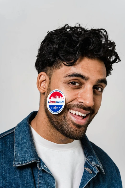 a man with a sticker on his face, a colorized photo, trending on reddit, instagram model, conservative, riyahd cassiem, official product photo