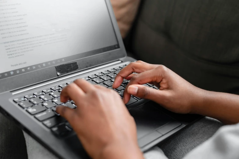 a close up of a person typing on a laptop, by Carey Morris, avatar image, multiple stories, maintenance, high resolution image