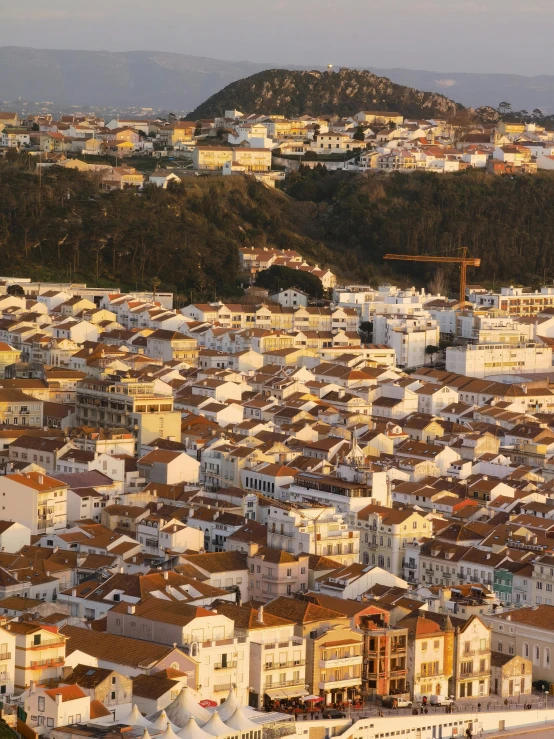 a view of a city from the top of a hill, by Nadir Afonso, pexels contest winner, renaissance, white buildings with red roofs, golden light, highly detailed in 4 k ”, “diamonds