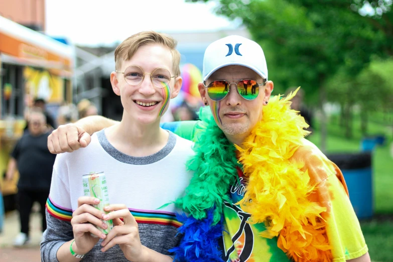 a couple of people standing next to each other, a photo, by Meredith Dillman, pride parade, avatar image, cute boy, 1 petapixel image