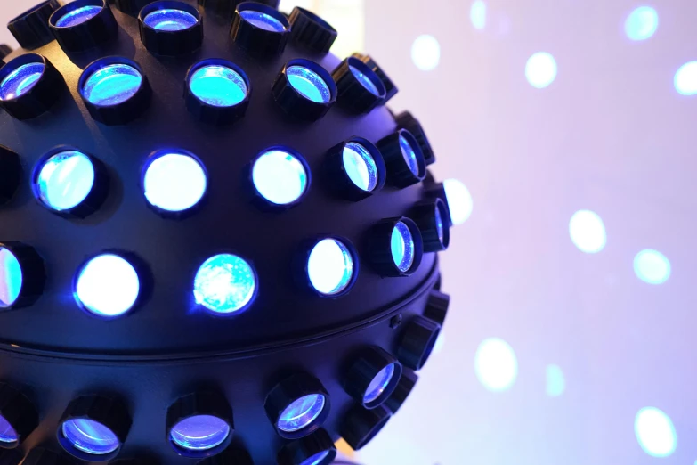 a close up of a disco ball with blue lights, by Joe Bowler, kinetic art, tactile buttons and lights, ready to eat, colour led, photo of a dyson sphere